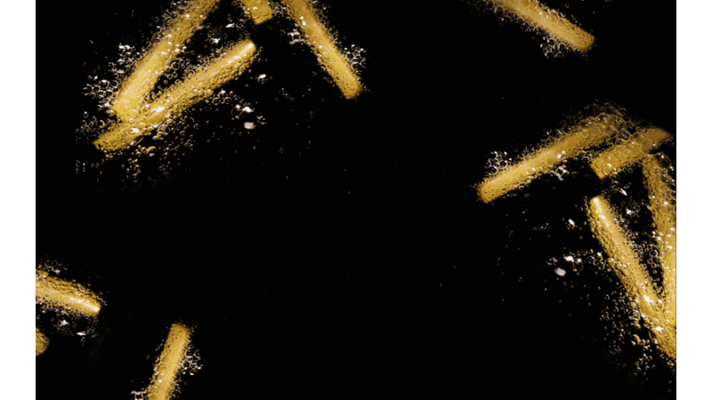 Remia Achtergrond zwart frites in frituurvet